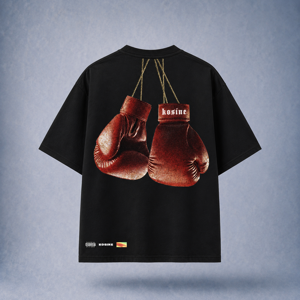 Black t-shirt with brown boxing gloves graphic on a gray background