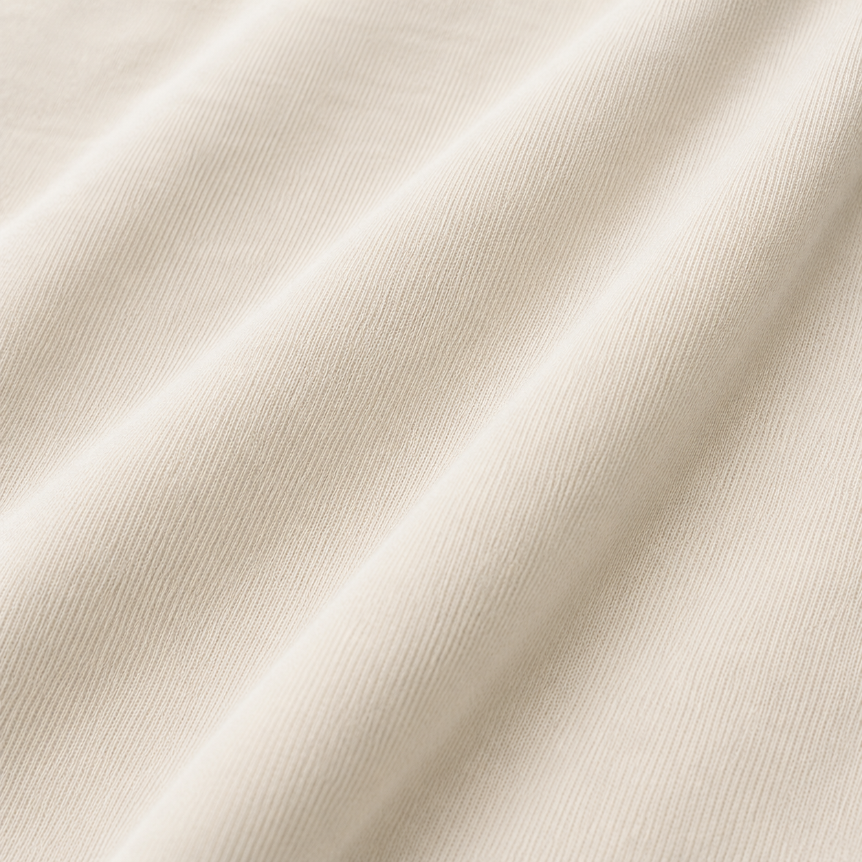 Close-up of beige / off-white fabric with a subtle texture