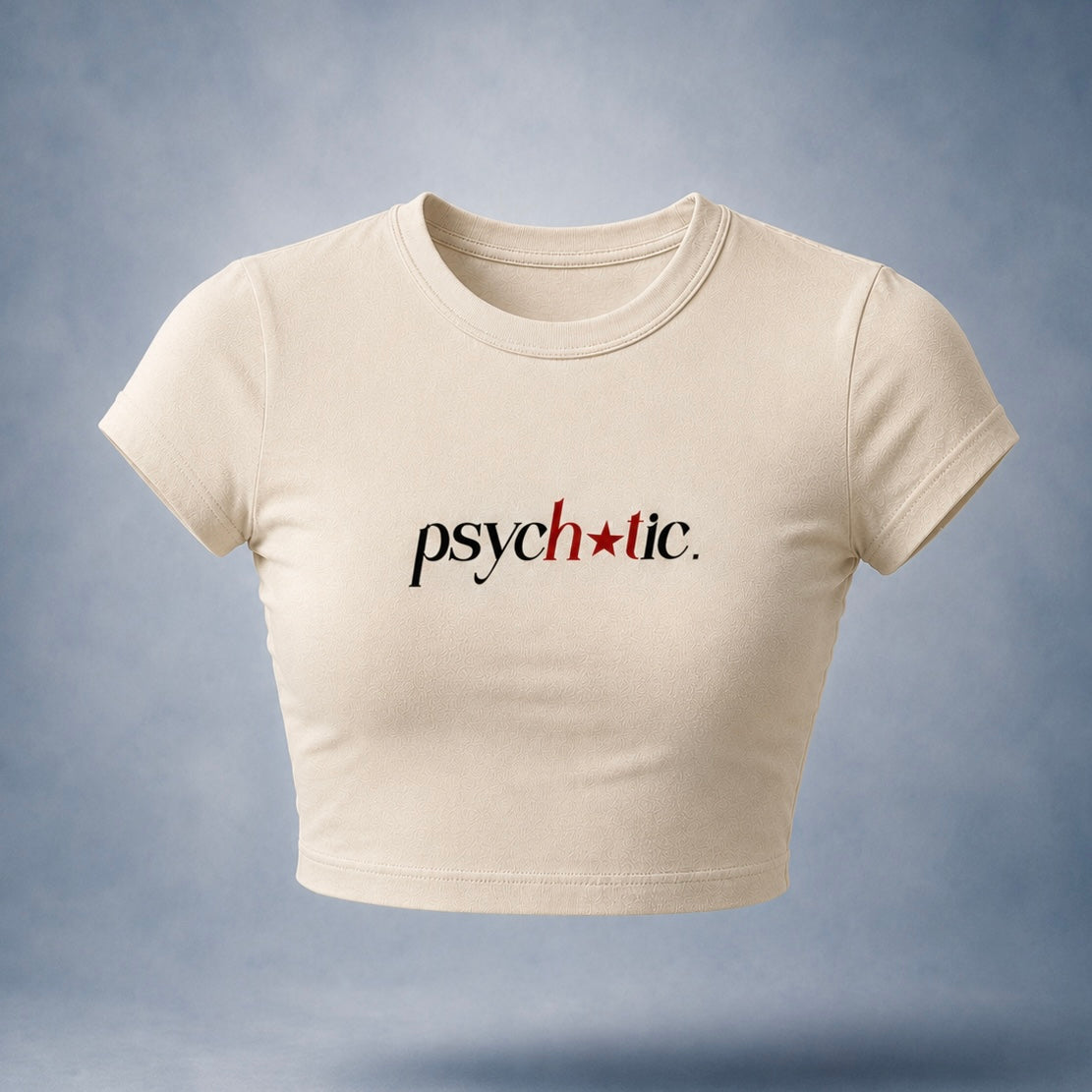 Off-white baby tee crop top with text 'psychotic.' on a blue background